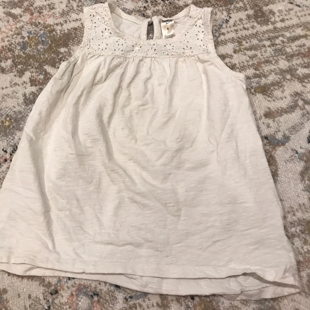 White sleeveless top